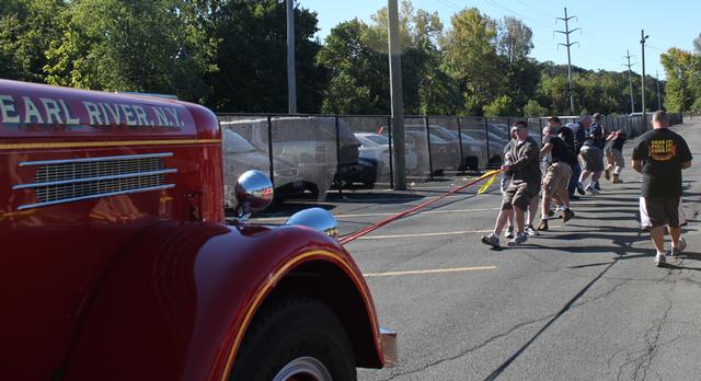 3rd Annual Fire Truck pull for Breast Cancer 9-23-2012. Won by Nanuet  Fire Department in 17.02 seconds,
Photo By Vincent P. Tuzzolino